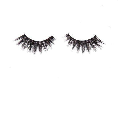 Pair of black false eyelashes on a white background