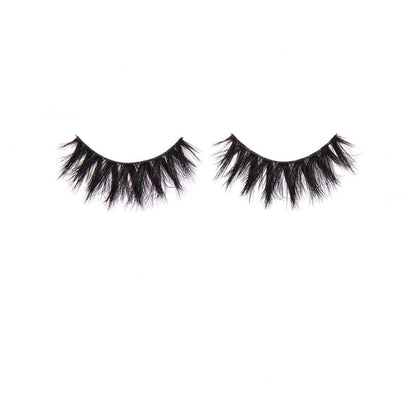 Pair of black false eyelashes on a white background