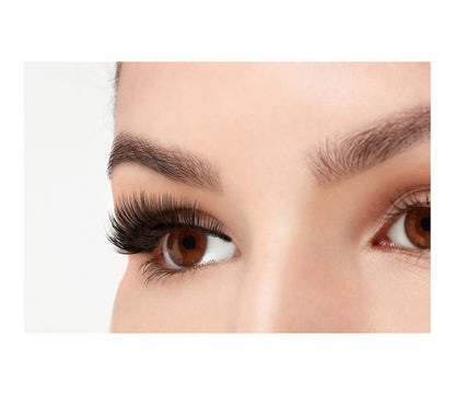 A model wearing Ardell 3D Faux Mink 854 in side view emphasizing the curly, flared & natural lash look