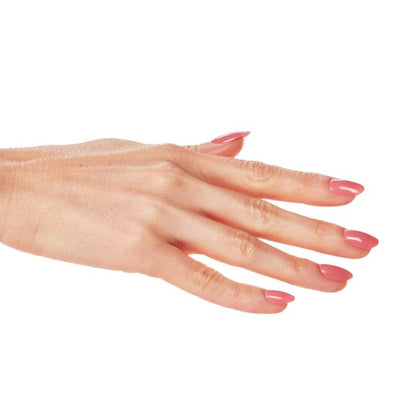 Outstretched hand with Ardell Impeccable gel polish, emphasizing elegant rosy nude nail color.