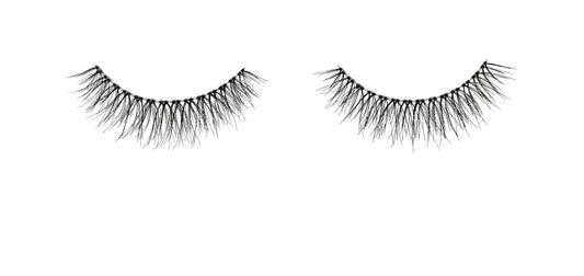 Close-up of a floating Ardell Naked Lash 420 faux lash for the right and left eye featuring its clustered lash fibers